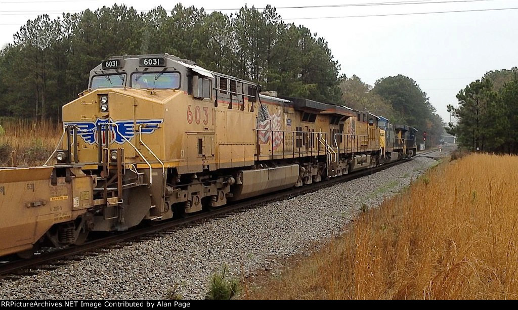 CSX 956 leads 245 and UP 7643 and 6031 to a stop